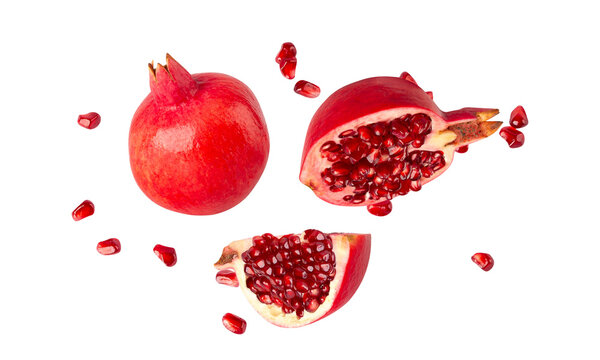 Falling Pomegranate fruit cutout, full depth of field. - Powered by Adobe