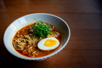 Ramen isolated on wooden table background