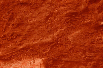 Grunge lush lava concrete background. Textured plaster wall. Creative backdrop for your design. Color of the year 2025 concept. Top view, layout for design. Surface with peeling shabby pattern.