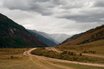 a country road in the Altai mountains in autumn