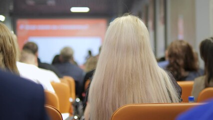 The audience actively engaged in an informative and enlightening conference presentation