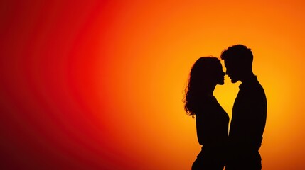 Silhouette of a couple in love against a vibrant sunset background, capturing a moment of intimacy and connection.