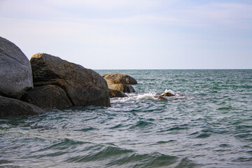 View of Penyusuk beach, a rocky beach in Bangka Belitung, Indonesia. Summer vacation concept