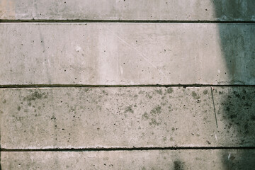 Boundary wall separating an upscale residential complex from a neighboring village area