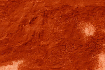 Grunge lush lava concrete background. Textured plaster wall. Creative backdrop for your design. Color of the year 2025 concept. Top view, layout for design. Surface with peeling shabby pattern.