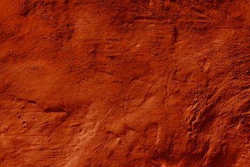 Grunge lush lava concrete background. Textured plaster wall. Creative backdrop for your design. Color of the year 2025 concept. Top view, layout for design. Surface with peeling shabby pattern.