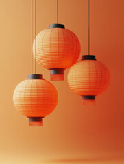 Fototapeta premium Hanging orange lanterns create warm and inviting atmosphere, perfect for festive occasions or cozy settings. Their vibrant color adds touch of elegance to any space