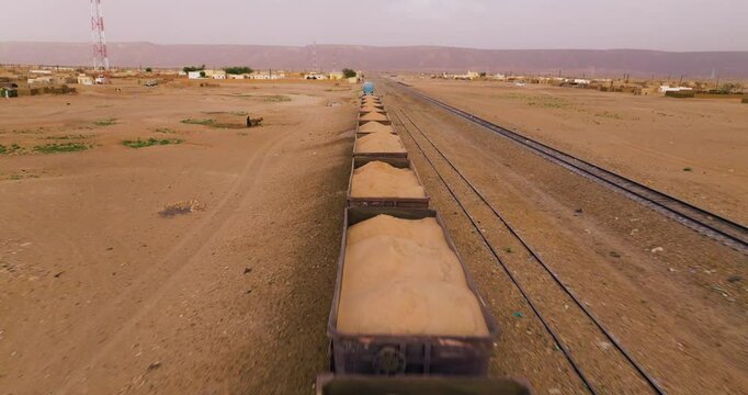 Train Wagons With Iron Ore Parked At Choum, Mauritania - Drone Shot