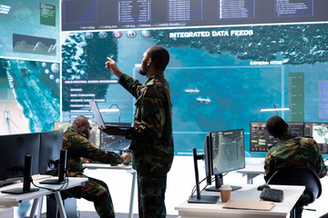 Empty United States military control tower office with the American flag, armed forces operation...
