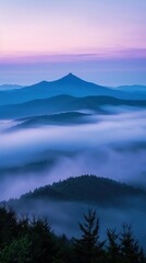 Ethereal Dawn: Aerial Capture of Head Mountain in Enveloping Fog