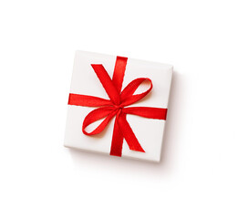 White gift box with red ribbon bow
