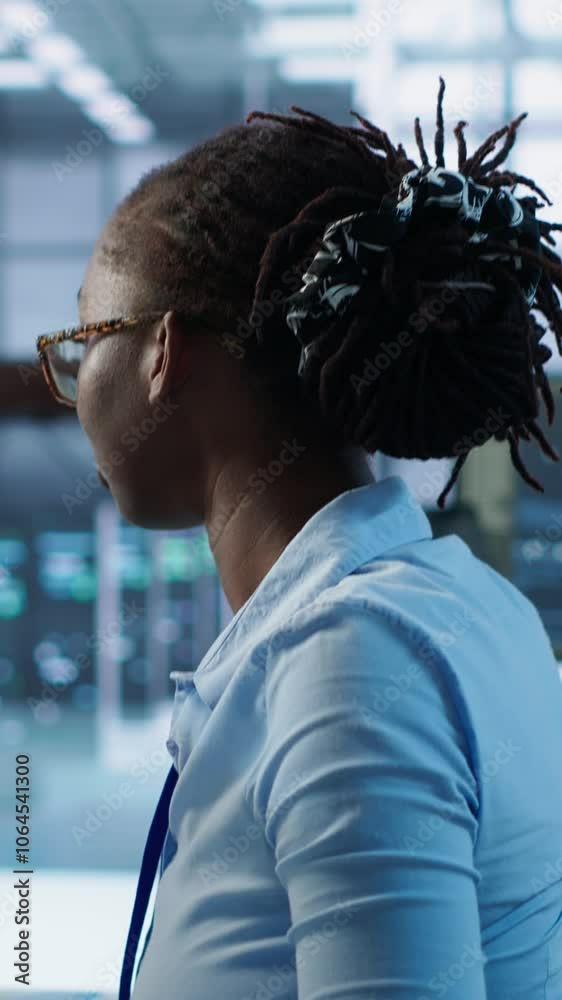 Poster portrait of happy computer scientist programming in ai data center used for machine learning trainin