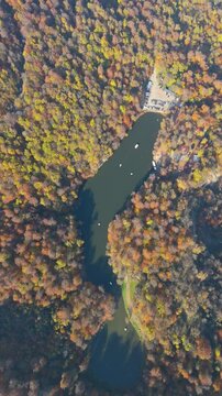 Colorful view of the autumn forest with lake. Parz Lake in Tavush, Armenia. Taken with a drone