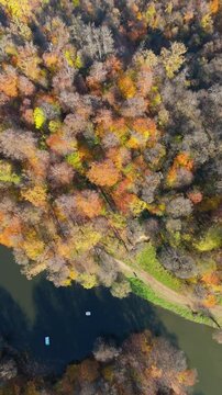 Colorful view of the autumn forest with lake. Parz Lake in Tavush, Armenia. Taken with a drone