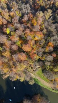 Colorful view of the autumn forest with lake. Parz Lake in Tavush, Armenia. Taken with a drone