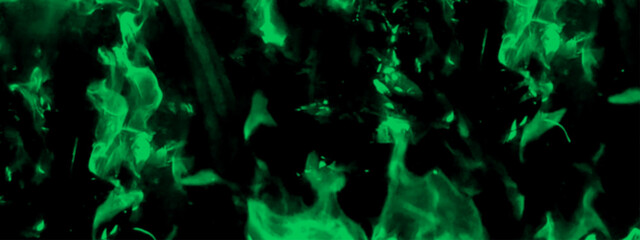 Abstract blue fire in dark background. Grunge texture black and blue color background. Festive New Year grunge background with Flowering design.	
