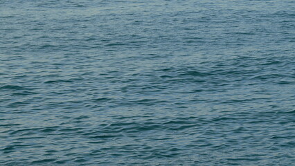 Fototapeta premium Concept - Vacation And Relax. Sea Surface At Sunset. Summer Landscape. Orange Sea At Sunset.