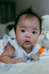 Two Month old Baby girl Practicing Tummy Time