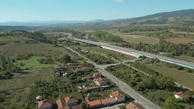 Highway And Country Roads Run Paralell Through The Bulgarian Countryside 4K 60FPS