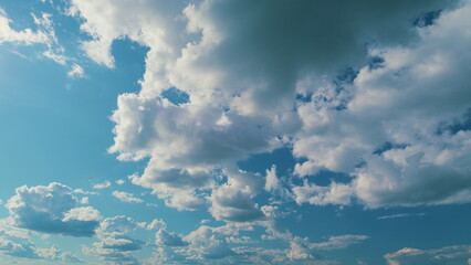 Airy Snow-White Clouds Move. Climate And Weather. Beautiful Background Sunny Cloudy Blue Skyscraper.