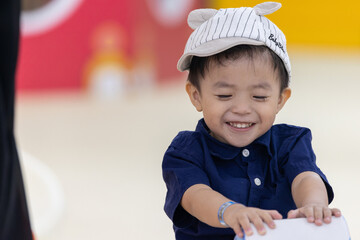 Close-up Portrait image of Happy 3-4 years old Asian Chinese child on happy mode