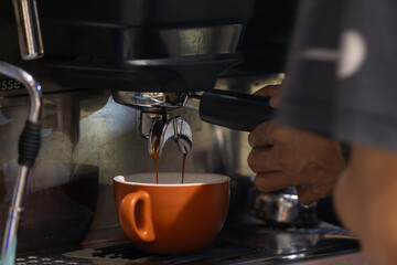 Coffee machine making espresso in a cafe restaurant