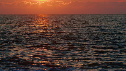 Sunrays Flickering In Ripples On Water Surface. Beautiful Evening Nature Sea Background.