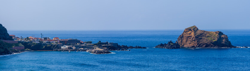 Obraz premium Scenic tall volcanic rock formations near Porto Moniz in Madeira Island.