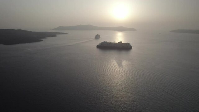 Two cruise ships with one going into sunset 4k drone footage Dlog 10 Bit ungraded