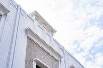 Modern Building Facade with a Bright Sky and Clean Architectural Lines