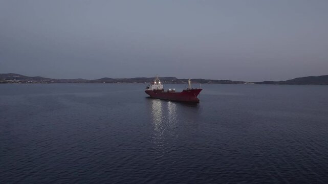 Cargo ship at sea with reflections 4k drone footage Dlog 10 Bit ungraded