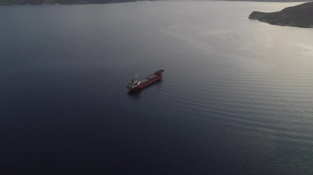 Cargo ship alone with rippling waves 4k drone footage Dlog 10 Bit ungraded