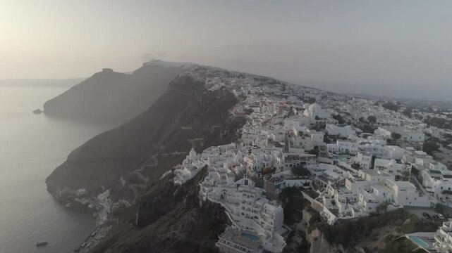 Orbit above cliff town at sunset 4k drone footage Dlog 10 Bit ungraded