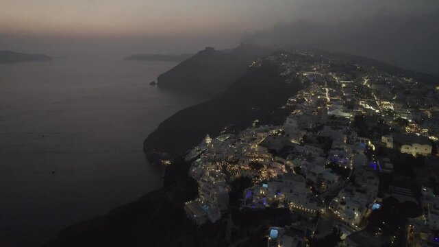 Sunset flight over Santorini through clouds 4k drone footage Dlog 10 Bit ungraded