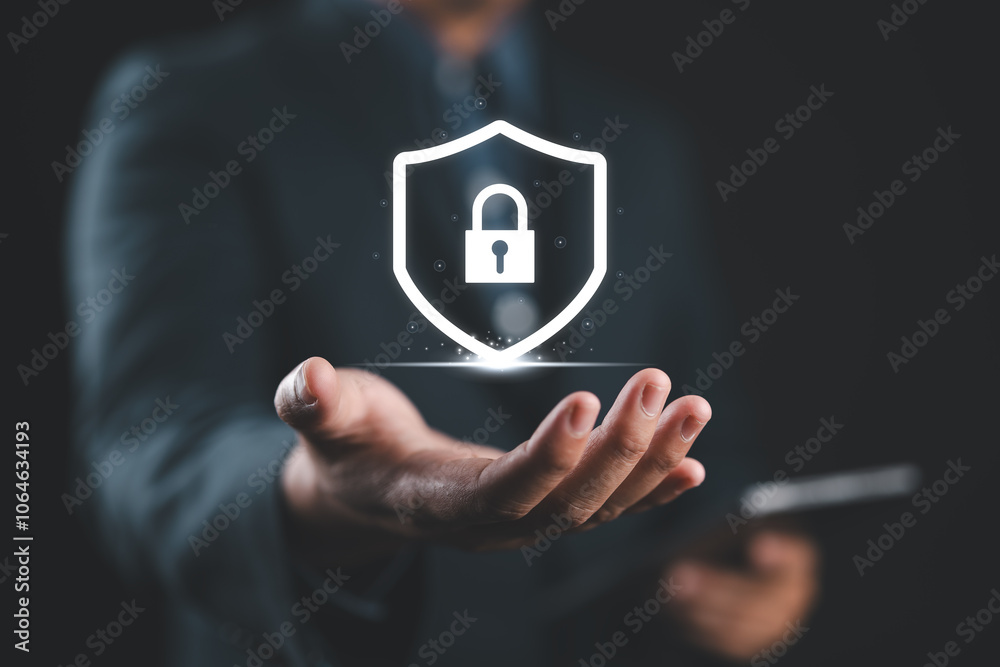 Poster Protection network security and information security system concept, Information and cyber security technology services. Businessman holding shield protect on virtual screen.