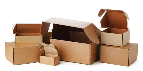 Stacked brown cardboard boxes in various sizes arranged on a white background