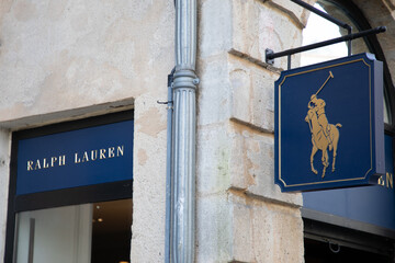 Fototapeta premium ralph lauren brand text shop and sign logo on facade store fashion chain signage entrance in street view storefront