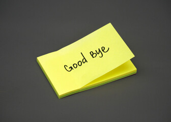 Yellow stick note with text Goodbye.