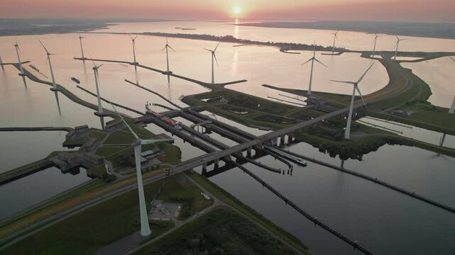 Majestic View Of Windpark Krammersluizen During Golden Hour In Bruinisse, The Netherlands. Aerial, wide shot
