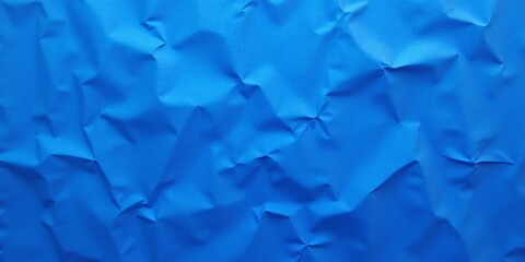 Obraz premium Crinkled Paper Texture Background In Deep Blue Color