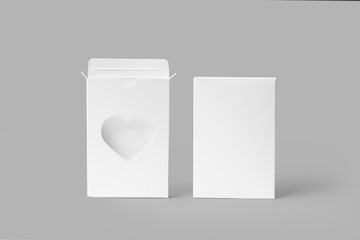 Slim white box with heart window on gray background