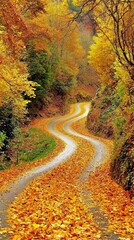 Obraz premium Serene Country Road Covered in Autumn Leaves