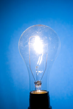 Close up of a lit tungsten Lightbulb