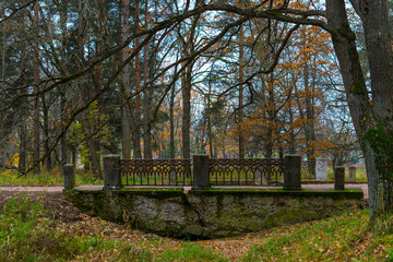 Old bridge in autumn park