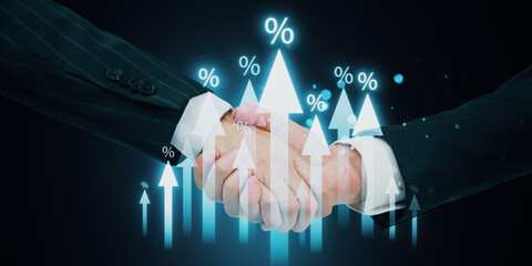 Close up of handshake with growing glowing interest arrows on dark background. Benefit, partnership, market and increase concept.