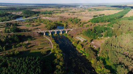 aerial drone country side view landscape river water stream and bridge road transportation object spring March month time