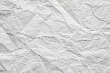 Blank white crumpled and creased paper texture background