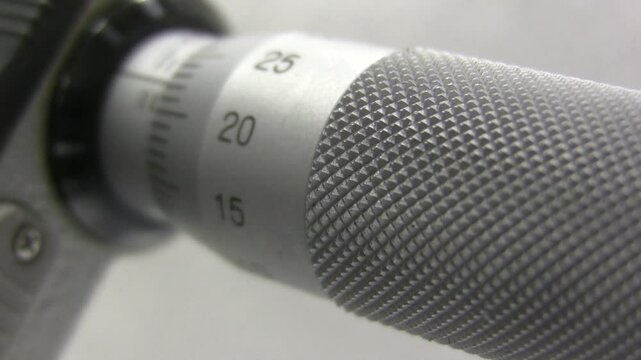 Measuring micrometer. Industrial measuring tool. Micrometers Mitutoyo. Wire measurement