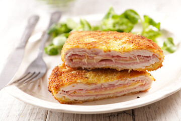 Cordon bleu on plate with lettuce