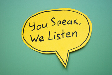 Phrase you speak, we listen on a note. Communication and understanding.